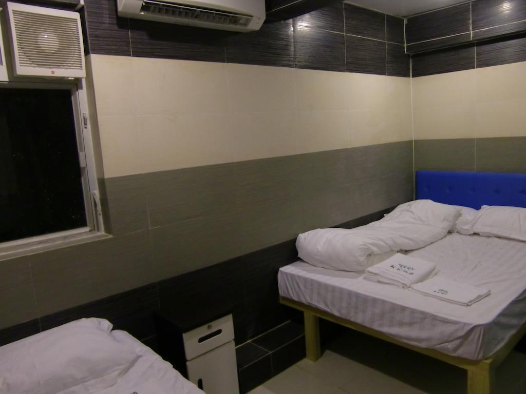 Kk Guesthouse Hongkong Zimmer foto